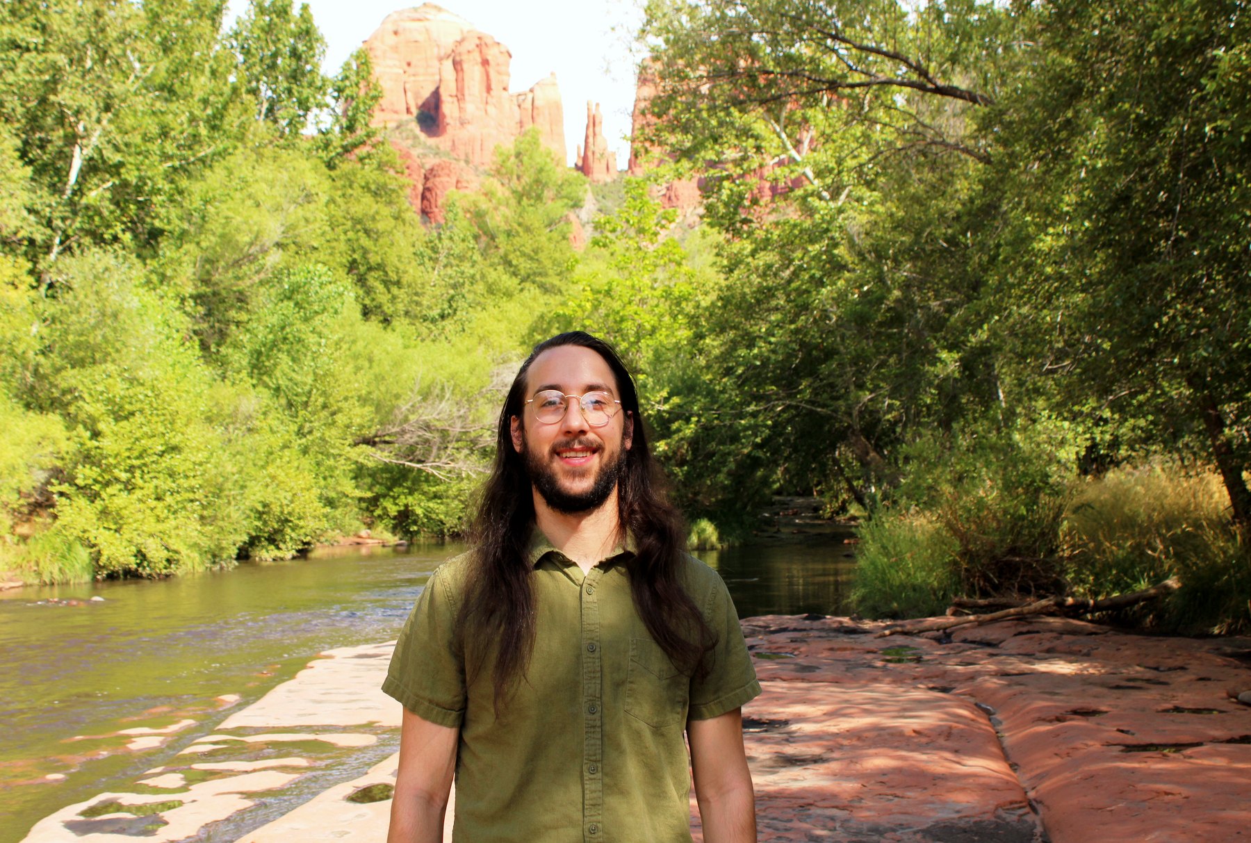 Joshua Martin beside Oak Creek beneath Cathedral Rock in Sedona